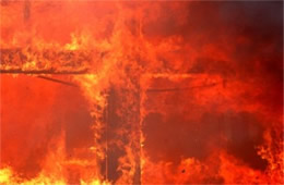 Window Pane Cross Engulfed in Flame